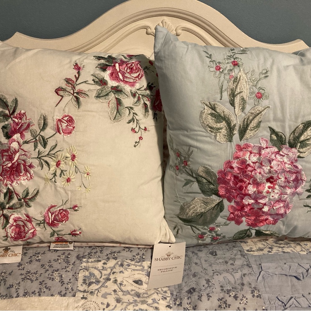 Embroidered floral pillow.